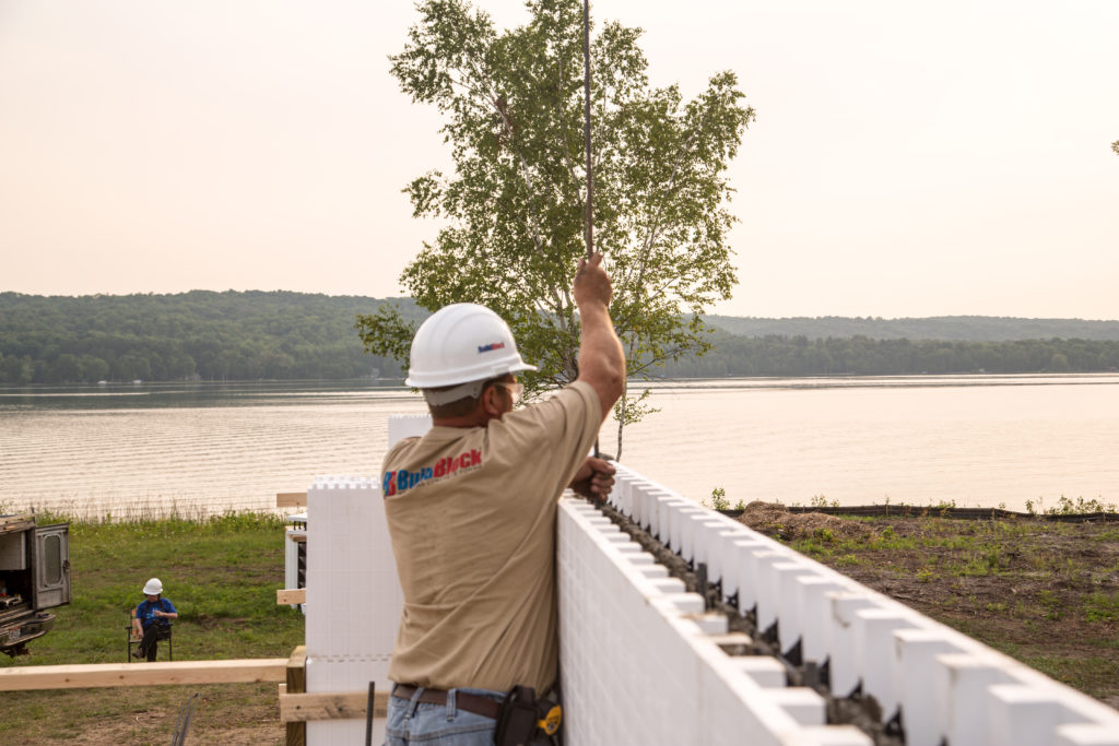 Placing vertical rebar after the last course is placed