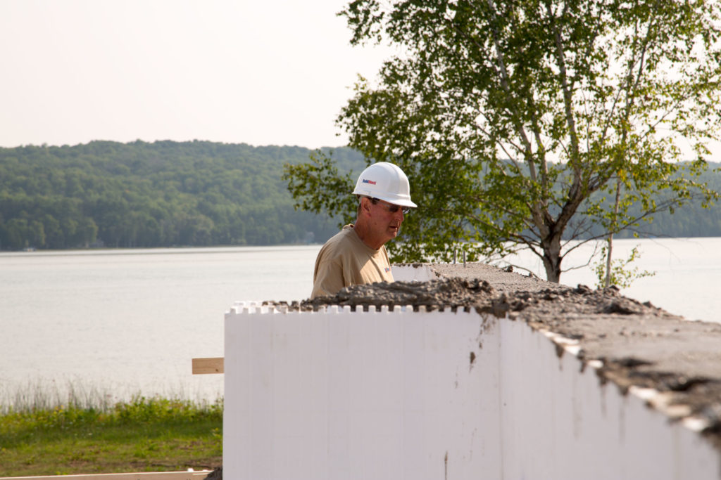 ICF wall poured and anchor j- bolts being placed.