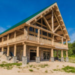 Log Cabin with ICF Basement below.