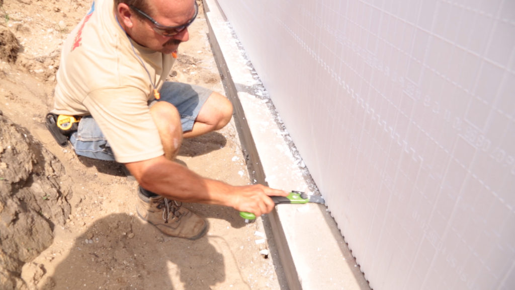 Shimming the block level at the footing