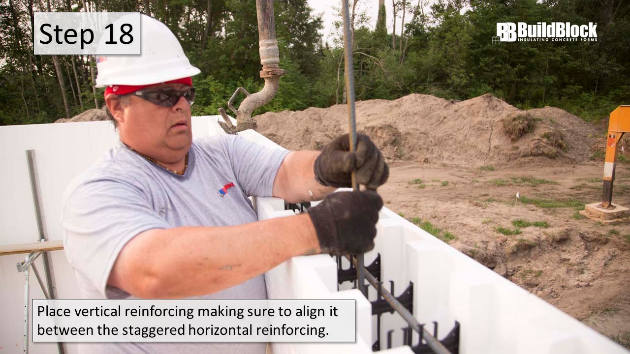 Step 18: Place vertical reinforcing making sure to align it between the staggered horizontal reinforcing.